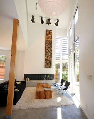 现代简约风格三层半别墅实用客厅沙发背景墙效果图