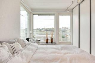 北欧风格二居室简洁白色床图片