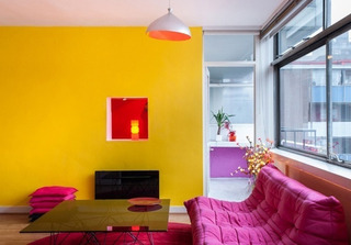 暖黄色客厅背景墙设计效果图