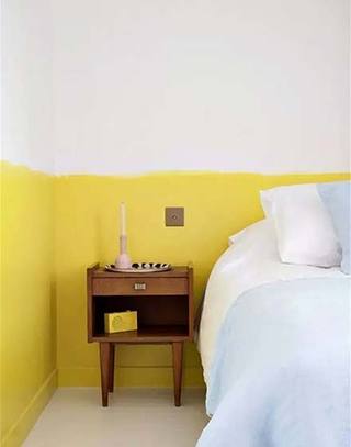 卧室黄白双色装修背景墙