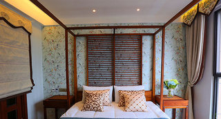 89㎡东南亚风格卧室背景墙设计效果图