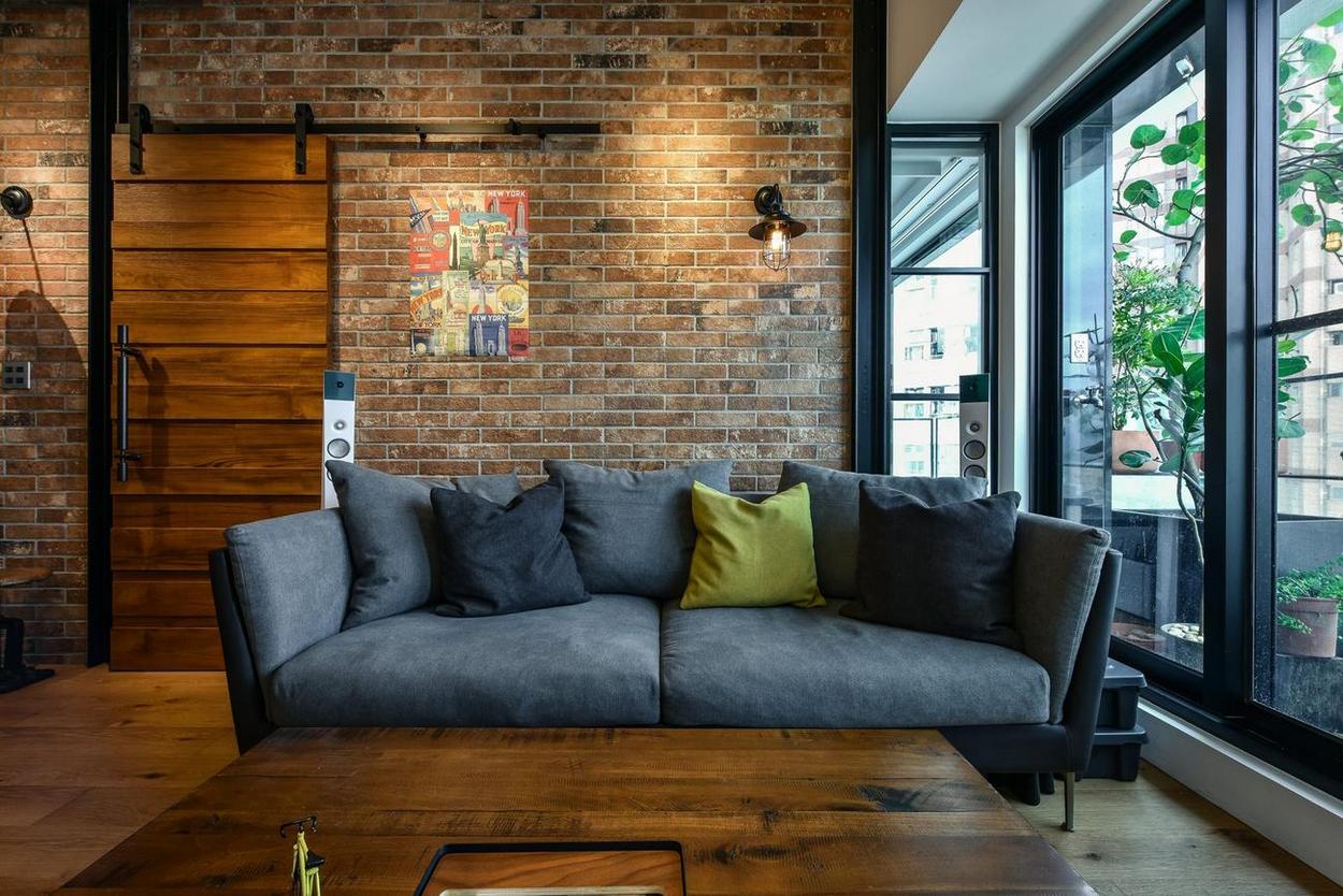 工业混搭风格公寓沙发背景墙装修效果图