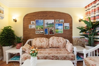 田园风格二居室沙发背景墙装修效果图