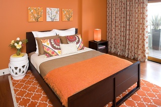 橙色系东南亚风情卧室效果图