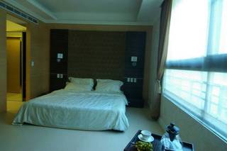 现代酒店式卧室 床头背景墙设计