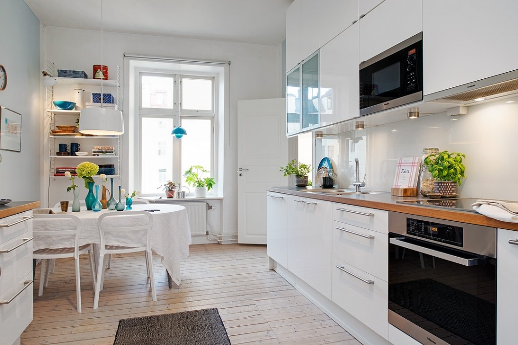 白色明亮北欧风格开放式厨房餐厅设计