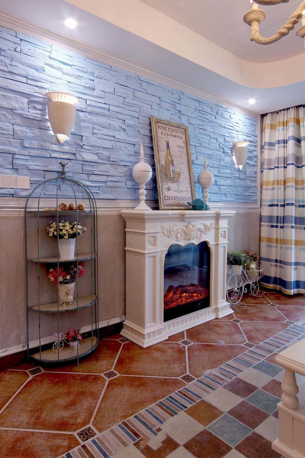 蓝色唯美地中海家居客厅壁炉装饰图
