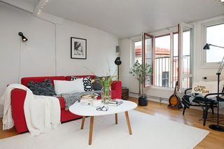 北欧设计装修风格公寓客厅红色沙发装饰图