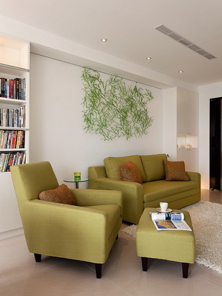 绿色清新简约休闲客厅沙发背景墙效果图