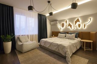现代装潢风格卧室床头背景墙设计效果图