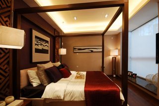 精致咖色系东南亚风格卧室实木床装修效果图