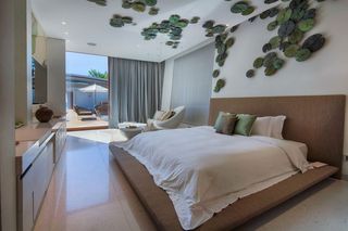 自然风情东南亚现代风格别墅卧室设计效果图