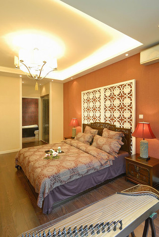 橙色新中式卧室镂空屏风背景墙设计